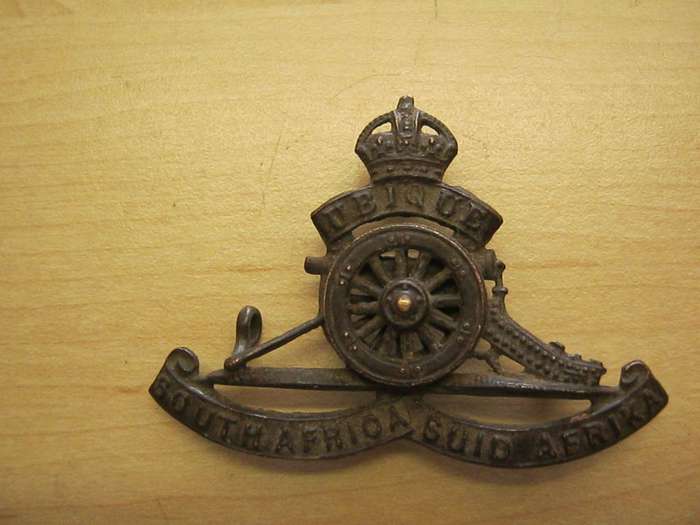 SA Ubique double wheel cap badge